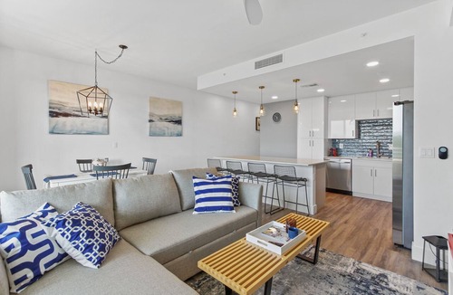 North Trail Condo | The Strand 521 - Luxury Top-Floor Suite - Breathtaking Bay Views - Pool & Spa