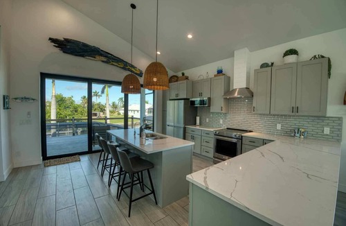 Saint James City House | Tranquil 3-bedroom canal front home with private pool in Saint James City