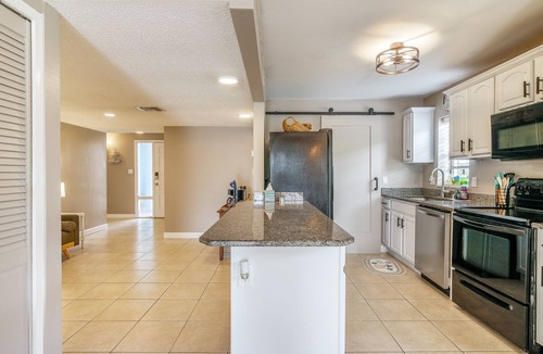 Capri Isle Condo | Treasure Island escape. Dolphins, manatees & beach