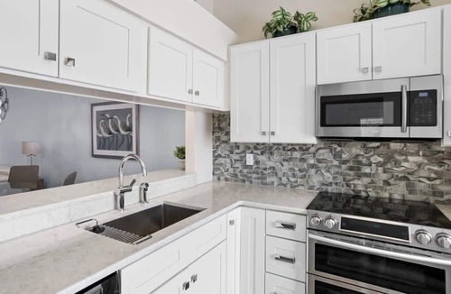 Capri Isle House | Treasure Isle Beach retreat; West-facing sunsets, 3 car garage, community pool!