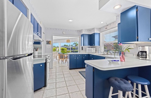 Sarasota House | Tropical Canal Home–Pool, Sun & Water Access: Paradise Cottage in LBK by RVA