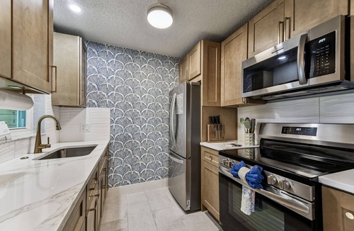 Capri Isle House | Tropical Oasis Near Treasure Island Beach