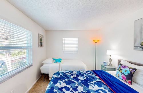Capri Isle House | Two-story waterfront retreat with dock, pool, central AC, fireplace, & fast WiFi
