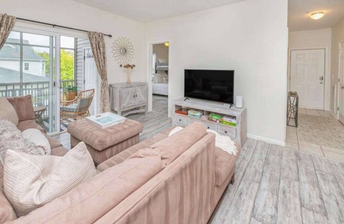Rehoboth Beach Condo | Villas at Bay Crossing dog-friendly condo with pool, balcony, water views, & W/D