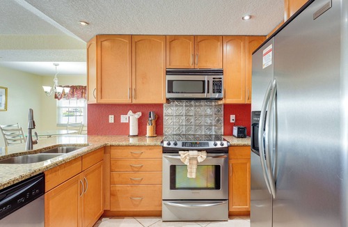 Capri Isle Condo | Walk to Beach! Treasure Island Gem w/Water Views