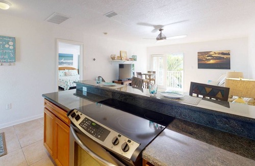 Pass-a-Grille Historic District Condo | Walk to The Best Restaurants, Beaches, and Activities. Heated Pool. Fabulous Location.