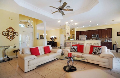 Caloosahatchee Villa | WATER VIEW, DIRECT GULF ACCESS , OVERSIZE POOL, GrilL, POOL BAR , TV