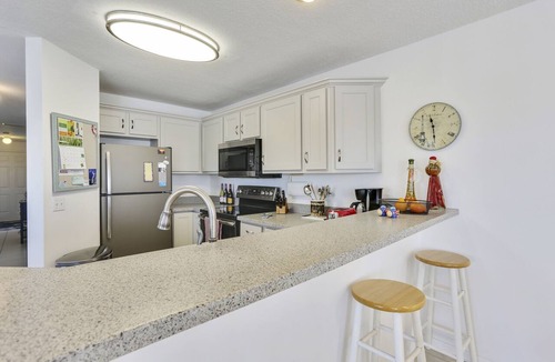 Treasure Island Condo | Water Views - Walk to Beach and Restaurants - Waterfront Pool - Low Density