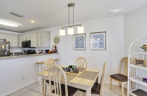 Treasure Island Condo | Water Views - Walk to Beach and Restaurants - Waterfront Pool - Low Density