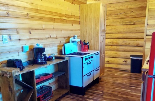 Grove Cabin | Waterfall View Cabin at White Buffalo Lodge; Family-friendly with lake access