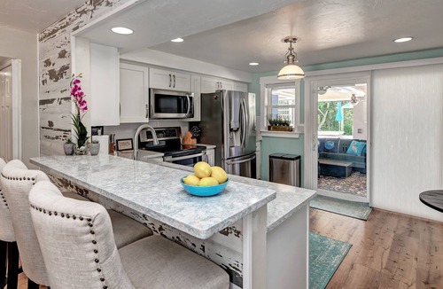 Anna Maria House | Waterfront -Canal, Tampa Bay, Large Heated Pool, Tiki Bar, Minutes to the Beach!