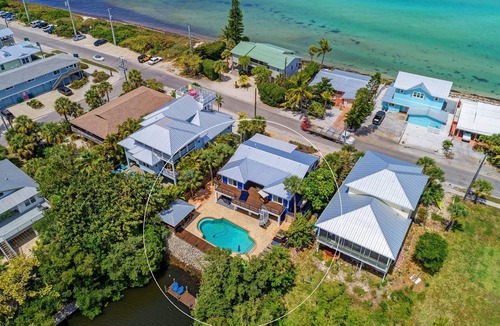 Anna Maria House | Waterfront -Canal, Tampa Bay, Large Heated Pool, Tiki Bar, Minutes to the Beach!