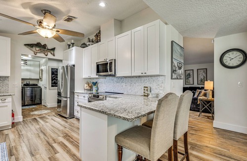 Dixie Shores House | Waterfront Home on Canal w/Dock & Pedal Boat!