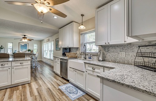 Dixie Shores House | Waterfront Home on Canal w/Dock & Pedal Boat!