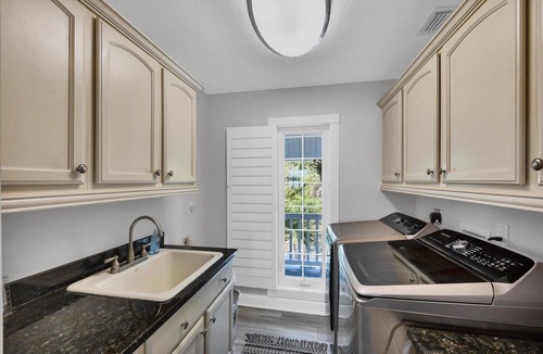 Palm Island House | Waterfront Retreat: Fish, Kayak,Paddleboard on Property +Pool/Spa-Heat available