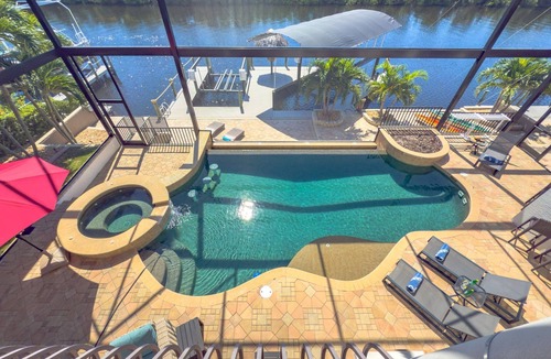 Peninsula Point House | Waterfront, Sunset Pool, Theater Room, Dock & Kayaks - Sunset Shore on 28th - Roelens