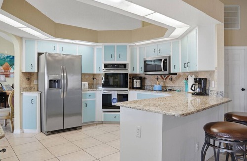 Gulf Cove House | Waterfront Villa with Pool, Dock and Gulf Access