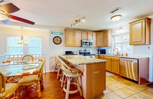 Holden Beach House | Wonderful Family House on Waterway w/Free WiFi, Private W/D, AC, Dock, Patio