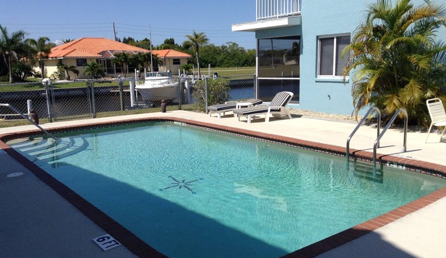 Come Home to Paradise in Punta Gorda Isles. Waterfront Dock Heated Pool Quiet