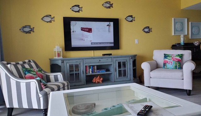 Enjoy the white sands of the Gulf of Mexico in luxurious and spacious condo.