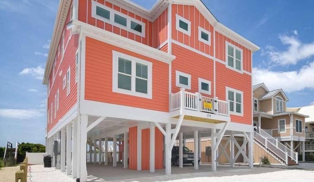 Hobbs Realty - Glad you're "Knot At Work" in this oceanfront home with a heatable pool and elevator