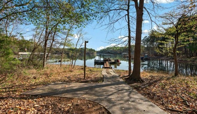Lake front with dock home in charming Fair Play with AC, fitness room