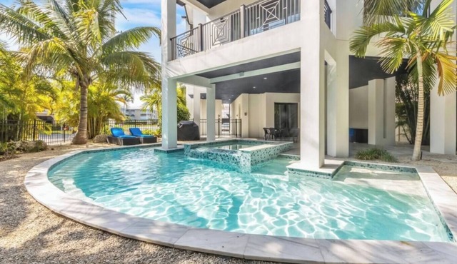 New! Beautiful beach house with heated Pool & Spa!