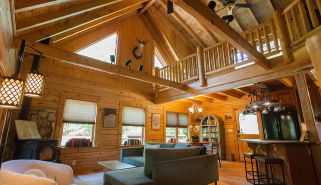 Riverfront Log Cabin with Treetop Views near Dahlonega- Hot Tub, Firepits, more!