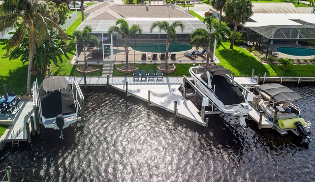 Stunning Remodel, HEATED POOL, Brand New Furnishings, Full Canal Sunset View