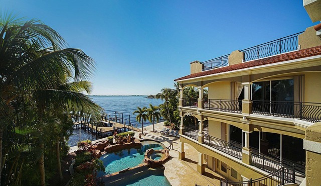 The Winslet Estate offers 5BR luxury, waterfront views, pool, spa, and game room - SWFL Rentals