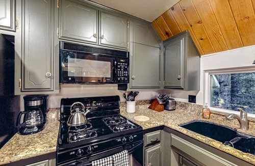 Crestline House | Enchanting lake retreat with fireplace, games, & great deck views - dog-friendly